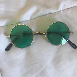 Round green sunglasses perfect for festivals!